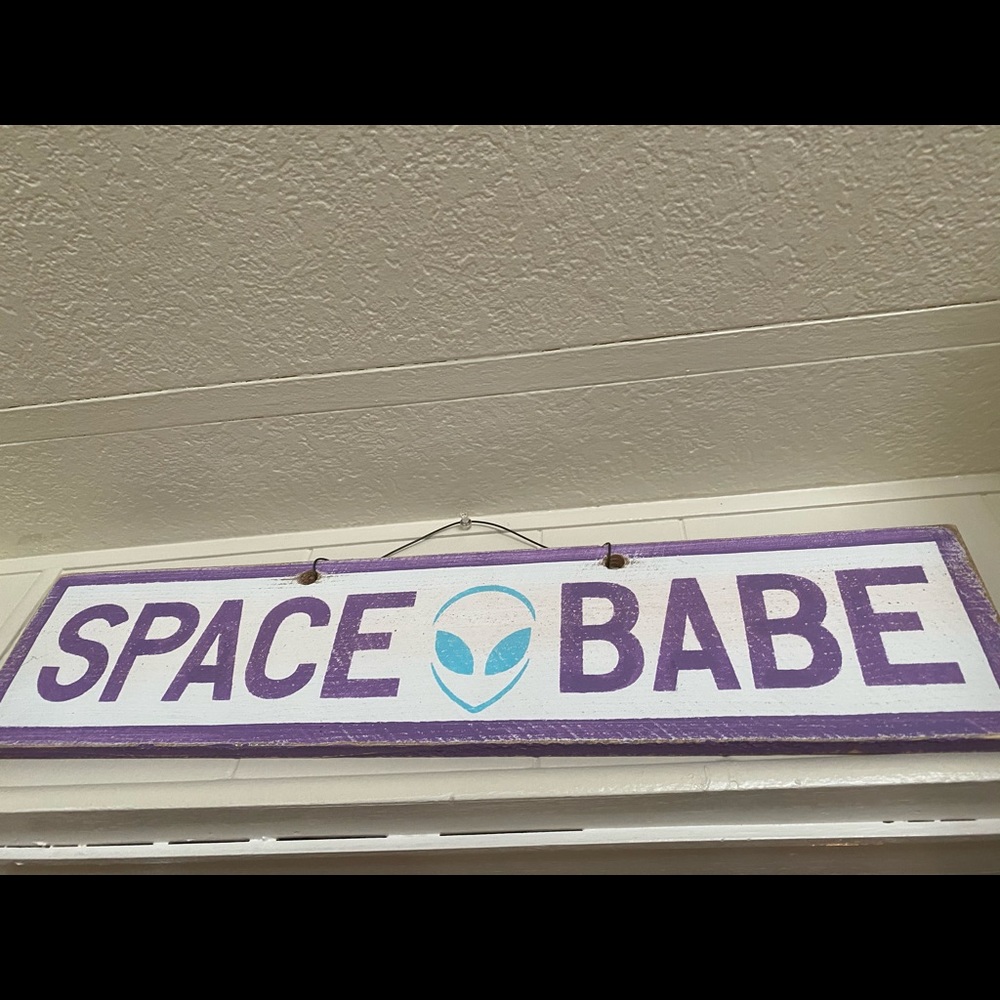 Customized “Space babe” weathered sign